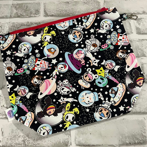 Toki in space bag