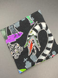 Beetlejuice yarn cozy