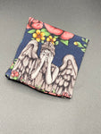 Floral Who yarn cozy