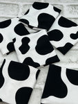 Cow print yarn cozy