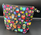 Snacks on black wedge bag